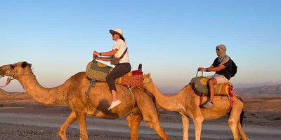 Agafay desert camel ride with dinner and live music. - Photo 1