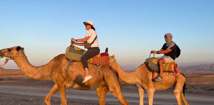 Agafay desert camel ride with dinner and live music.